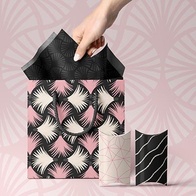 giftbag and pillow boxes mockup with spooky in style patterns